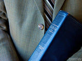 man holding a bible man holding a bible