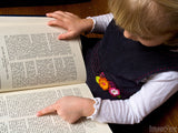 young child reading the bible young child reading the bible