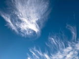clouds in a deep blue background clouds in a deep blue background