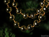 christmas background garland of beads on tree christmas background garland of beads on tree