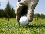 man gloved had places golf ball on tee man gloved had places golf ball on tee