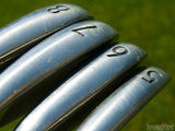 closeup of golf club irons closeup of golf club irons