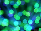 green and blue light christmas circles background green and blue light christmas circles background