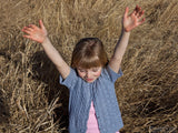 young girl hands held high young girl hands held high