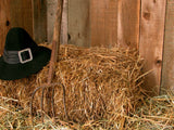hay bale in barn with Amish hat hay bale in barn with Amish hat