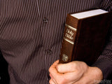 man with bible at church man with bible at church