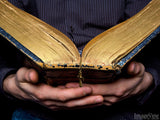 hands holding an open bible hands holding an open bible