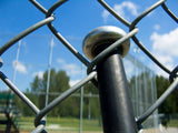 baseball bat hung on chain link fence baseball bat hung on chain link fence