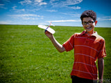 boy field with plane on independence day boy field with plane on independence day