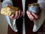 jesus holding communion cup and bread jesus holding communion cup and bread