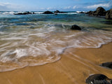 ocean waves gently roll up on sandy beach ocean waves gently roll up on sandy beach