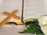 open bible with the cross