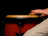 closeup of man playing a bass drum closeup of man playing a bass drum