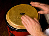 man playing a base drum man playing a base drum