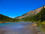 gentle flowing river by the foot of the mountains gentle flowing river by the foot of the mountains