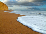 sandy beach and sea foam sandy beach and sea foam