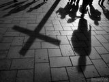 cross shadow on a sidewalk background cross shadow on a sidewalk background