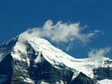 cloud at top of snow capped mountain cloud at top of snow capped mountain