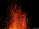 lots of sparks from a campfire lots of sparks from a campfire