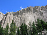 steep cliff with white rock cliff steep cliff with white rock cliff