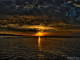storm cloud at sunset over the ocean storm cloud at sunset over the ocean