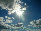 the sun coming through the clouds the sun coming through the clouds