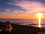 a sunrise on a beach in Hawaii a sunrise on a beach in Hawaii