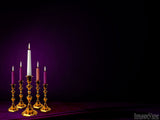 a traditional advent candle set lit