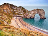 arch by the sea with sandy beach