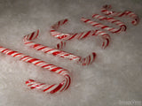 christmas background candy canes spell jesus