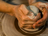 clay spinning on a potters wheel