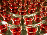 closeup of communion cups in tray