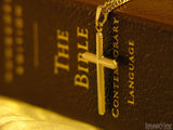 bible with cross pendant