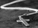 cross pendant on silver chain