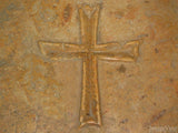 stone background with cross embedded in it