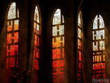 stained glass windows with crosses as background