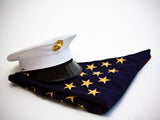 folded flag with service hat