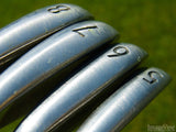 closeup of golf club irons