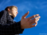 man hands lifted in worship