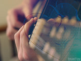hands playing guitar closeup