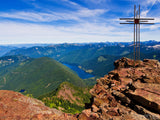 iron cross on a mountain viewtop