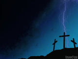 lightning strikes in the background of three crosses
