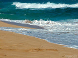 sandy beach with rolling waves