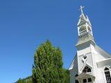 church steeple in the blue sky