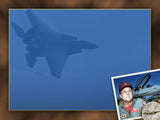 blue plane background with the pilot framed picture