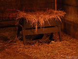 the wooden manger in old barn hay
