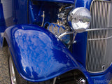 vintage blue ford truck fender closeup